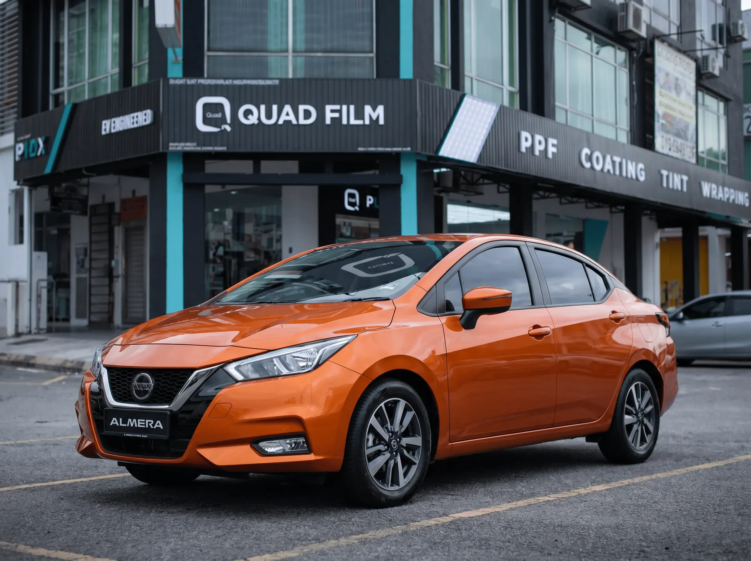 Nissan Almera selepas pemasangan tinted QUAD Film