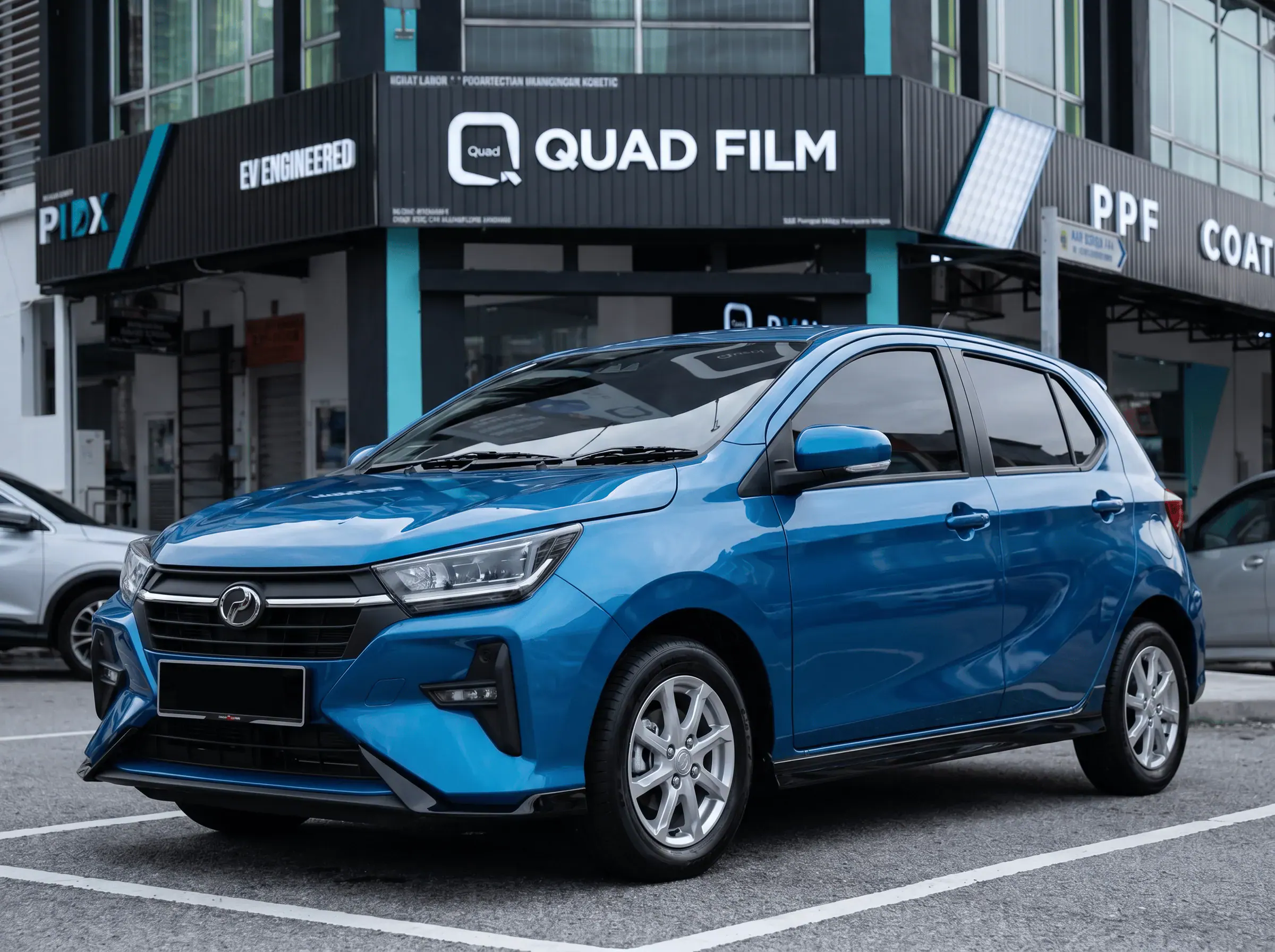 Perodua Axia selepas pemasangan tinted QUAD Film