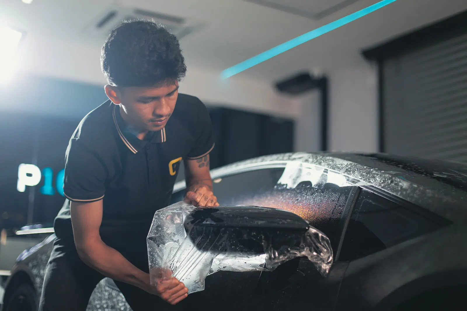 Close-up of paint protection film wrapped around a car side mirror, from a Jetour T1 PPF Malaysia guide