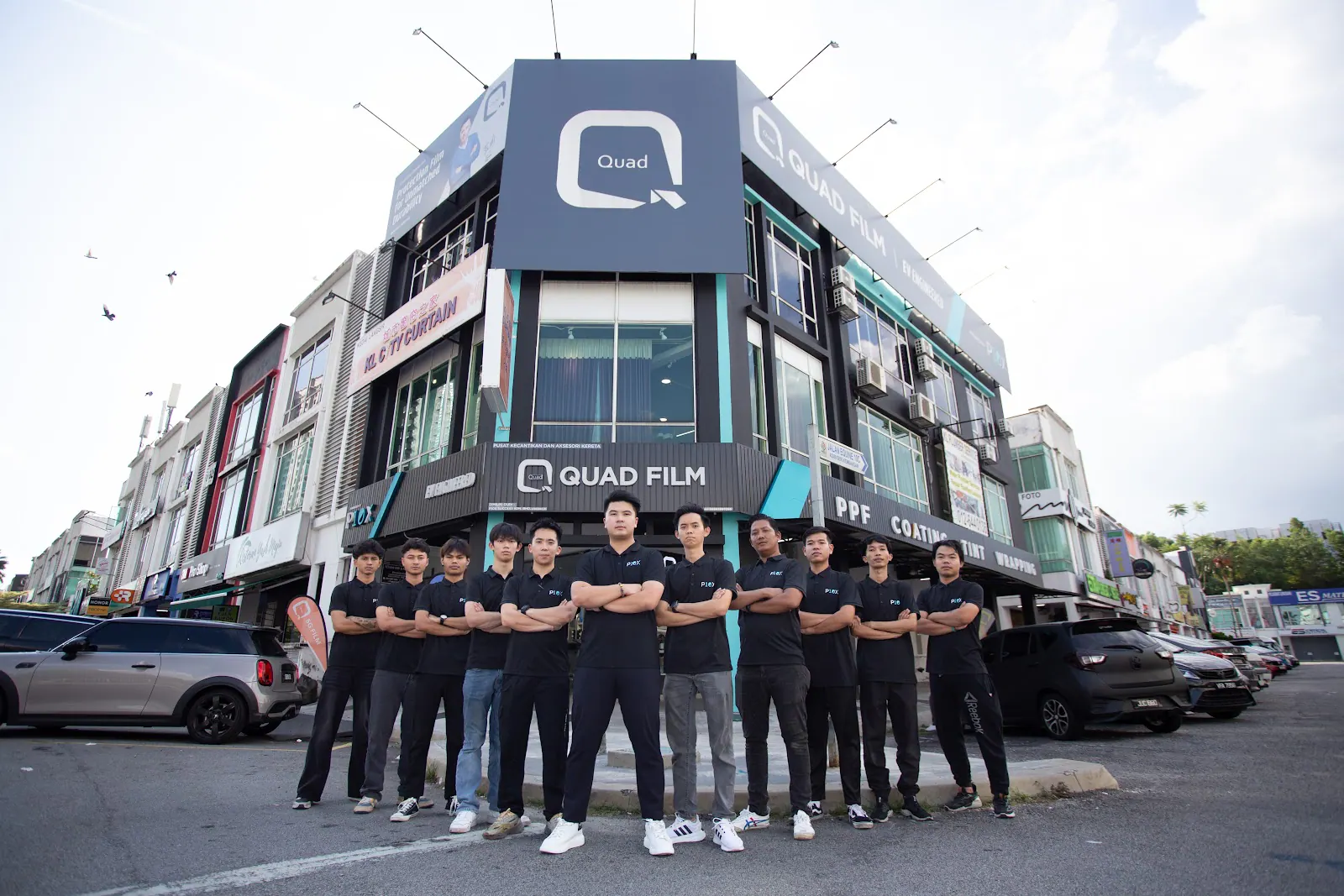 An installation team at a Malaysian branch, the people whose work decides how a Jaecoo J7 PPF job actually turns out.