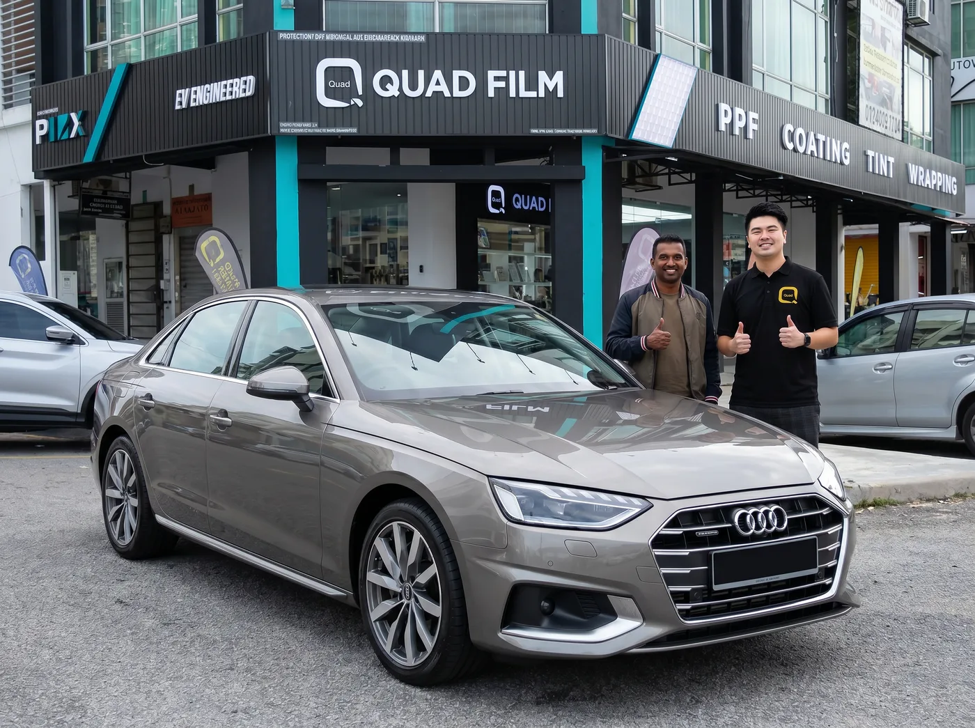Audi A4 车主与 Quad Film 团队在安装漆面保护膜后合影