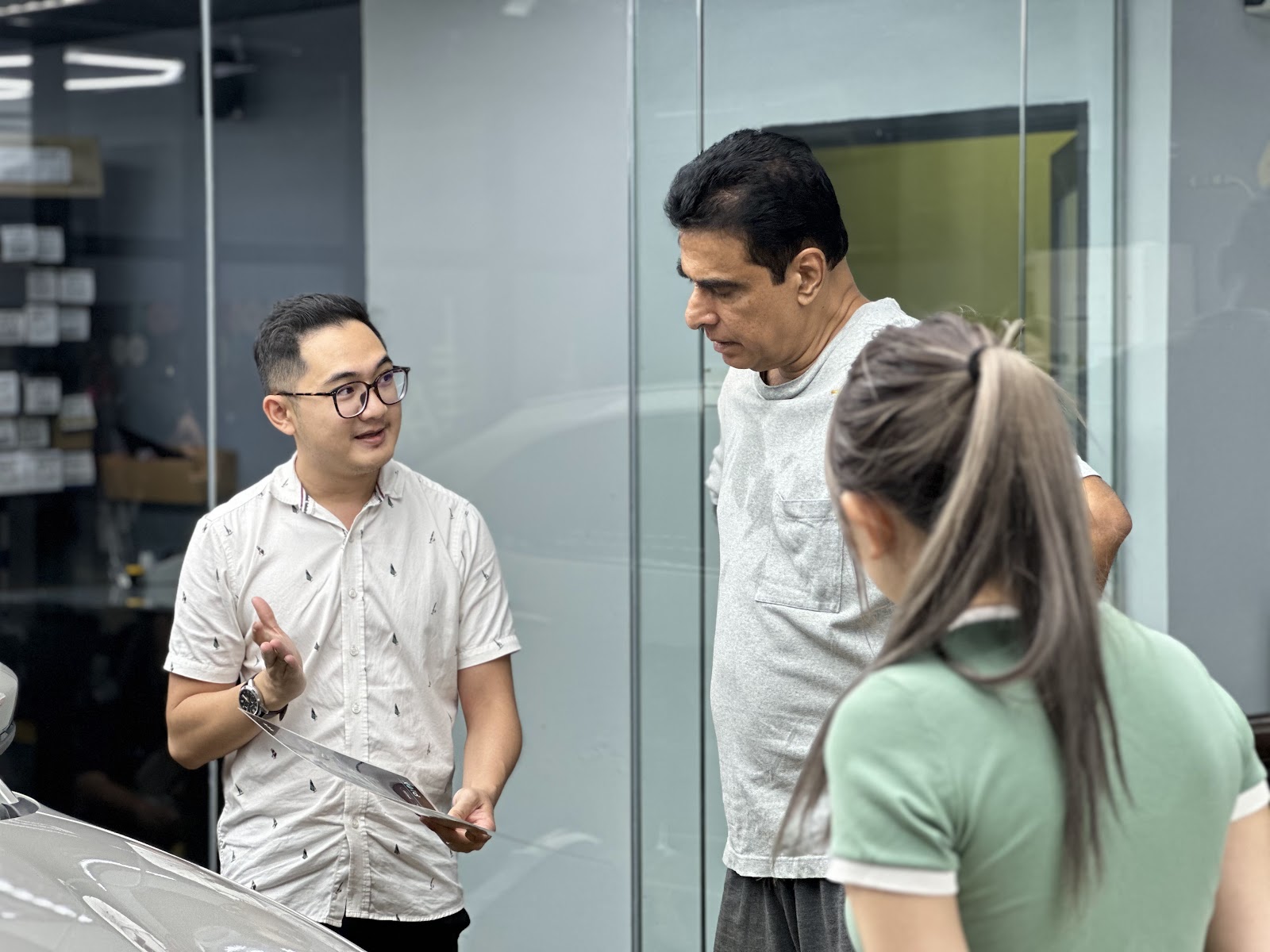 Sales consultant explaining services to customers.